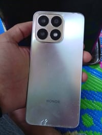 هونر اكس ٨a • ١٢٨ • رام ٤+٤