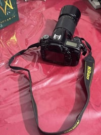 نيكون D7000 • عدسة 70-300 • شتر 60 ألف