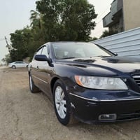 زيرا وارد أمريكي حادثه جاملغ وباب الخلفي محرك 3300 موديل 2006 مصبوغه ع...