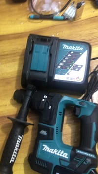 دريل ماكيتا اصلي مستخدم اخو الجديد الجهاز + الشاحنة فقط  بدون بطارية ل...