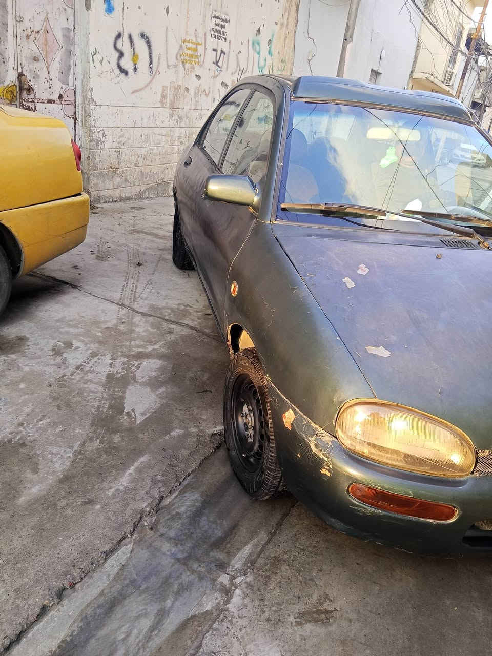 مازدا حجم 121نينوى موديل 1991رقم انكليزي بسمي محرك بدايت نفخ كاربون بانزين ورقي شرط الوكالة وتحويل السعر 18ورقة وبيها مجال الاتصال على الارقام ***********/***********
