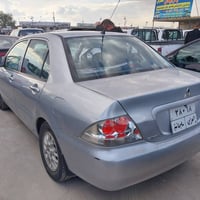 لانسر • ٢٠٠٩ • ١٤٠٠٠٠ كم