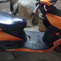 موتوسيكل • شغالة • فيها تبخير