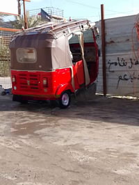 توك توك • مركبة • مواصلات