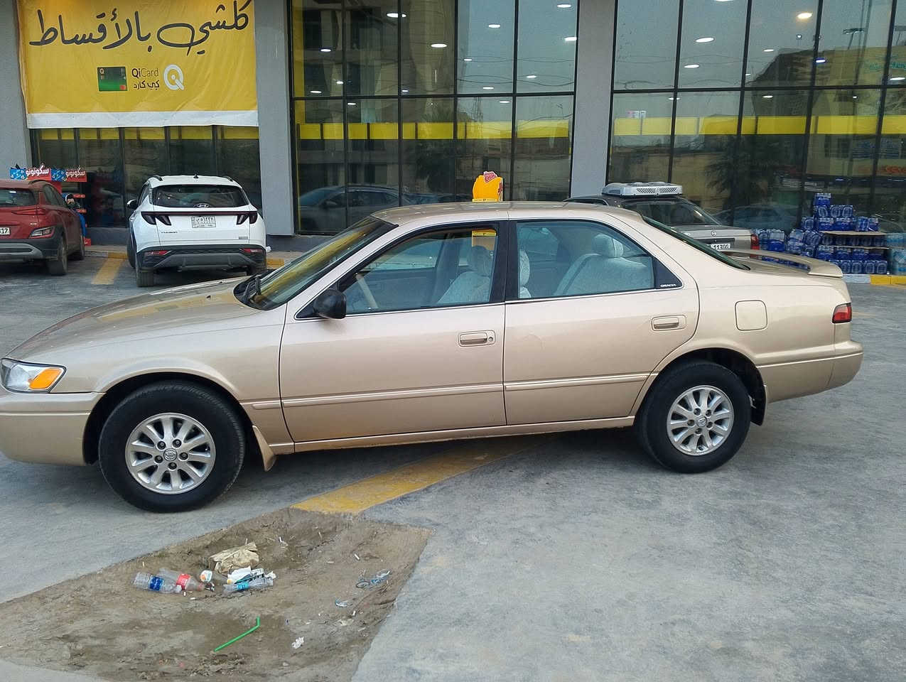 السلام عليكم موديل 97 كامري وارد امريكي سياره جديده وخير من الله رقم بغداد مكان  السياره البياع السعر 80 رقم ***********
