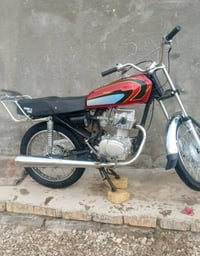 دراجة نارية • مستعجل • قلعة سكر