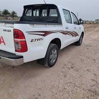 تيوتا هايلوكس موديل 14كويتي شاصي 19 و تماتيك رقم واسط سنويه 2031  مكفو...