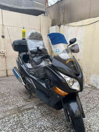 سلفر ونج جيتي محرك ٤٠٠ دراجه حلوه ونضيفه دراجه بيها صبغ ماشيه ٤٤ مكاني...