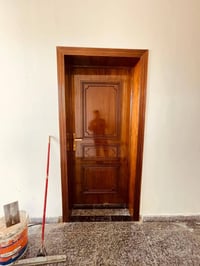 عمل جميع الابواب الخشب الصاج لكافه محافظات العراق  ويوجد خدمه شد.ونقل ...