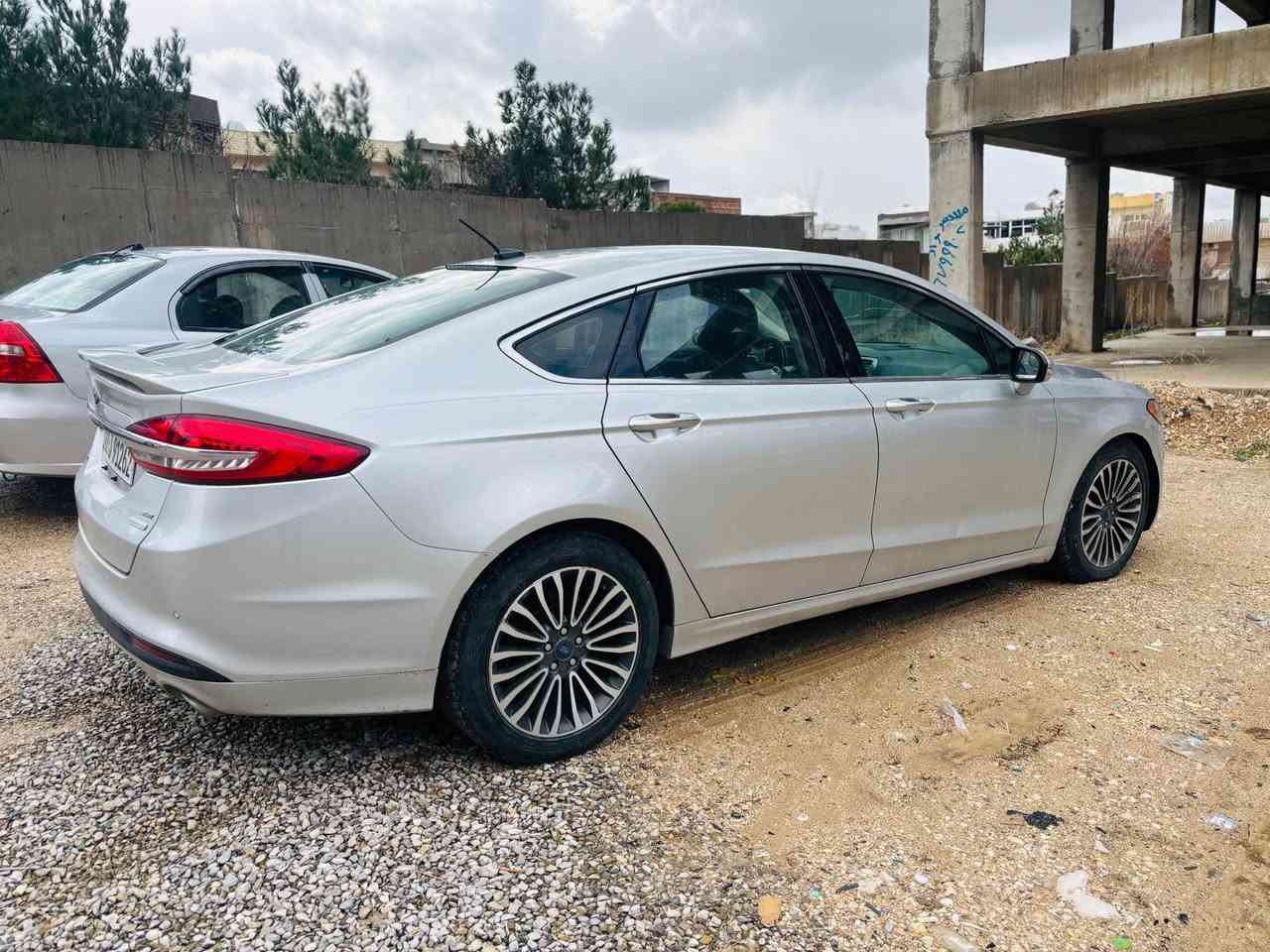 Ford fusion 2018 SE
گێڕ و مەکینە بەشەرت مەکینە نەکراوەتەوە مەکینە١.٥
کوشن جلد و هیتەر سێ شاشە کامێرا حاسە  بەسمە شەغال گێڕ ماوس کوشن کارەبا دەرگا کۆد تایە و ویل و پێش تیتانیۆم ئاوێنە ئیشارەت باڵێ سەر سنوق 
یەک چەمەلغ پێشەوە بۆیاخ 
١٠٠$قفڵ
*********** السليمانية, العراق
