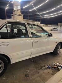 بروتون 2004 بيها قطعه وحدة صبغ فقط   والباقي وضعية شركة ماشية 88 الف  ...