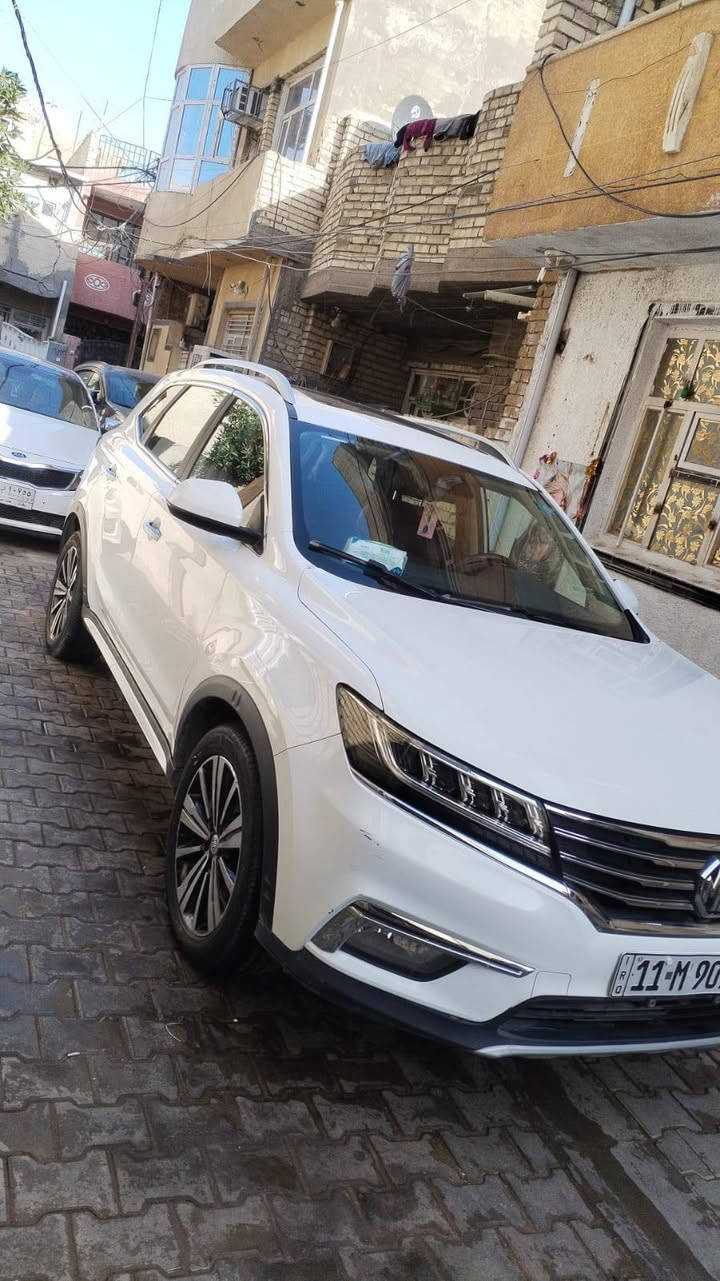 السلام عليكم MGRX5 البيع  سياره جديد ونضيفه على أيدي مال بيت ماشيه 40 كم بعدها بضمان شركه موديل 2021 فول سياره سايد بريك كهربائي بنوراما حساسات  السبير ويل كب حجم المحرك 1500 تيربو سياره  سنويه 27 تنتهي بأسمي  السياره السعر 128 ورقه بيها مجال رقم ***********
