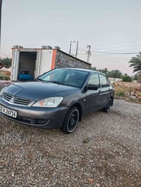 لانسر ٢٠١٠ • محرك ١٣٠٠ • رقم اربيل