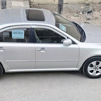 اوبتيما • ٢٠٠٩ • مكينة ٢٤٠٠