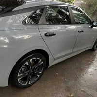 K5  2024 Gt line  فول مواصفات ماعدا الفتحه داخل احمر جلد  رقم بغداد با...