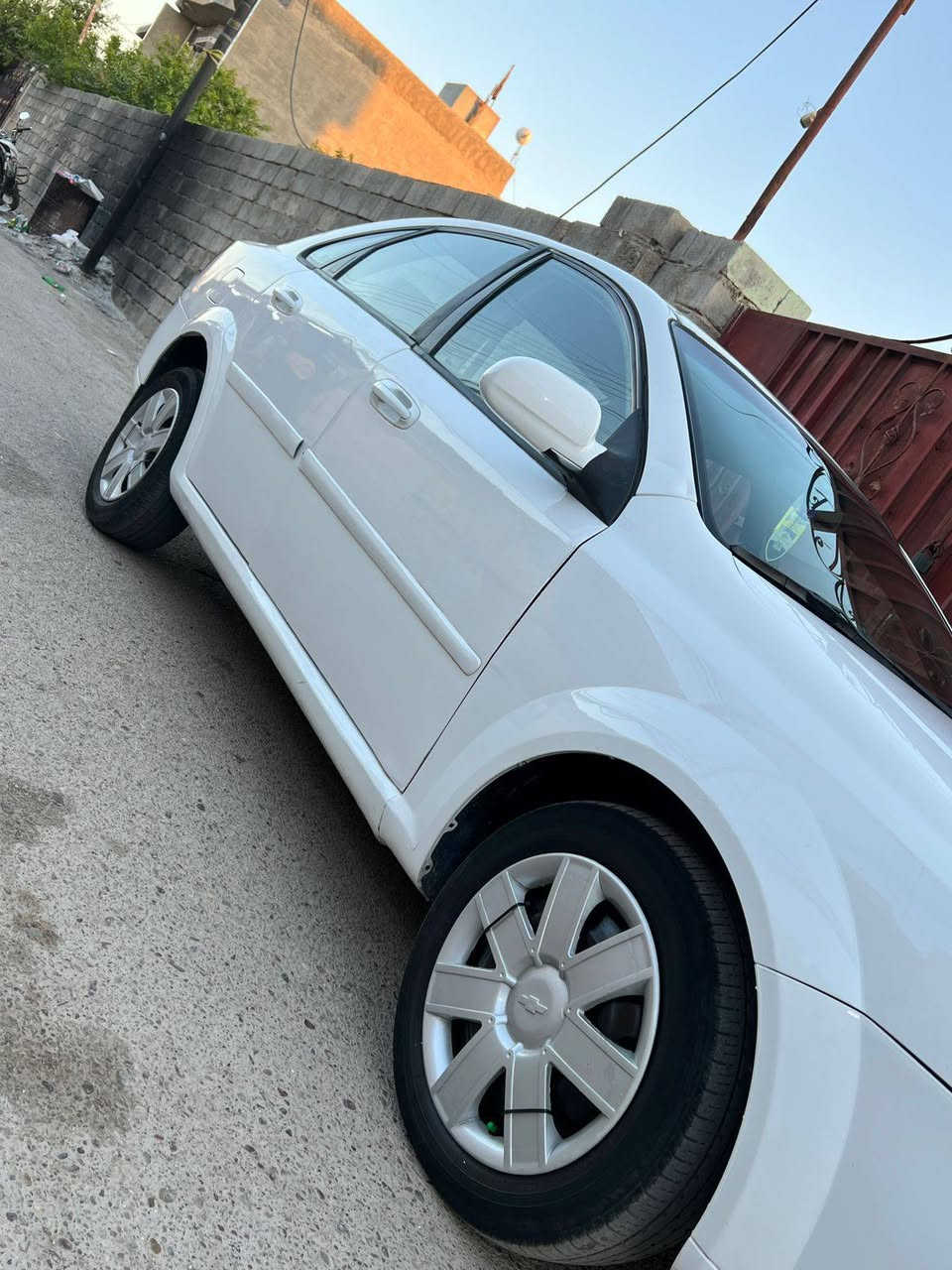 السلام عليكم شوفرليت اوبترى 2011 رقم كربلاء دولي مميز باسمي شرط التحويل سنويه وهزه جديده كير مكينه خير من الله كفاله صدر امامي خلفي نضيف مشط ستيرن جديد شاشه وكامره دواره  سياره نضيفه حيل مال جناي بيه صبغ حزام بدون ضربه قويه السعر 68 وبيها مجال بسيط حك الجيه مكان السياره قضاء بلد للاستفسار الاتصال ***********
