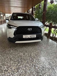 كورلا كروز للبيع 2024 ماشية 8000 بعدها زيرو  رقم بغداد بأسمي السياره ك...