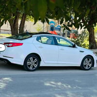 اوبتيما • ٢٠١١ • مكينه ٢٤٠٠