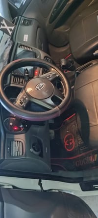 كيا ريو للبيع موديل 11 رقم اربيل گير توماتيك،  گير محرك شرط  داخل اسود...