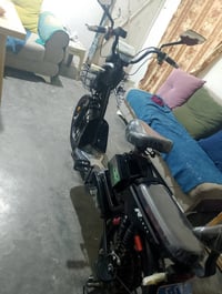 موطور شحن • ٤ بطاريات • رمادي صوفيه