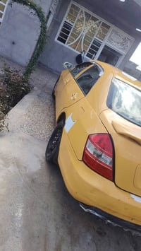 بي واي دي F6 موديل 2011 رقم بغداد نكليزي بسمي مصفرة هيئه وغرامه شرط ال...