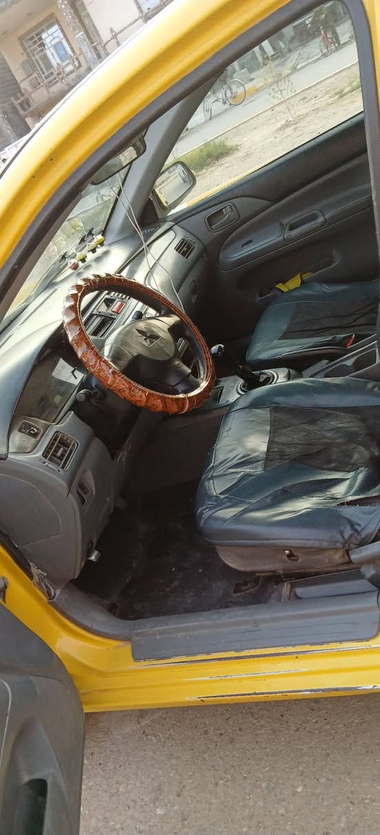 لانسر رقم ديالى ٢٠١٠ بيه طخه الخشم البنيد وبيه بلبك لايت طخه بدون ضرر سعرر ٦٣ وبيه مجال مكان ديالى الويجهيه 
***********
