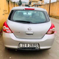 نیسان تیدا 2009 گیر ئۆتۆماتیک  سلفەر  خەلیجی  ناو زەرد جام کارەبای  فۆ...