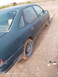 أوبل فكترا اللبيع موديل 94 سنويه 2027 رقم بغداد جديد بسمي السعر 28 وبي...