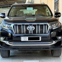 اخوان عندي برادو 2022 TXL   ساز  لون اسود رقم بغداد بأسمي ماشيه  65 ال...