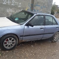 مازدا ٣٢٣ • مكينة ٨ • أربيل