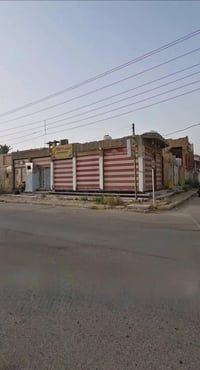 الناصرية شارع الاخلاص • ٣٠٣م • ٤ محلات