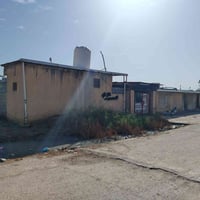 شقة أرضية • أبو صخير سكن المطار • كراج لسيارتين