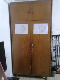 كنتور ذو بابين خشب صاج مع ملحق السعر 125000 بغداد حي الاعلام 077065999...