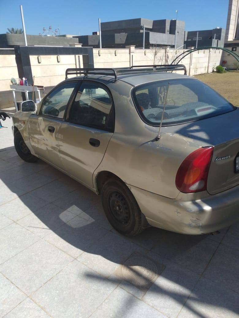 دايو لانوس موديل ٢٠٠٠ مكفولا من ضربه وحداديه ومحرك وكير عادي السعر ٣٠ ورقه وبيه مجال  لشراي الاستفسار اكثر *********** بيه وتساب وتصال رجاء مكلف بالنشر غير متواجد على الفيس
