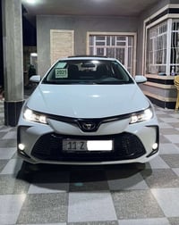 كورلا خليجي هايبرد فول 1/1 رقم بغداد  موديل 25 محرك 1.8 ماشيه 10 الف  ...