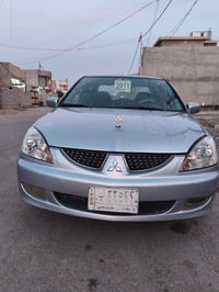 لانسر • مكينه ١٦٠٠ • رقم بغداد ٢٠٢٩