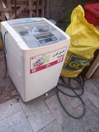 غسالة • نظيفة