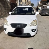 للبيع كيا كارنز خليجي 2012 رقم بغداد  (د) تحكم ستيرن فتحه سبعة راكب سع...