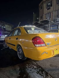 للبيع نيسان سني مال شركه 11كير عادي رقم بغداد بسمي مضروبه كلير فقط وبي...