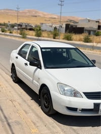لانسر • ٢٠١٠ • كويسينجاك