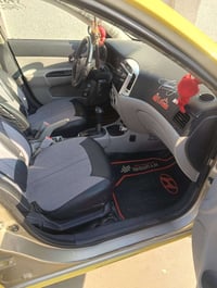 اكسنت للبيع موديل 2009بدون ضرر رقم نينوئ ألماني شرط التحويل هيه وغراما...