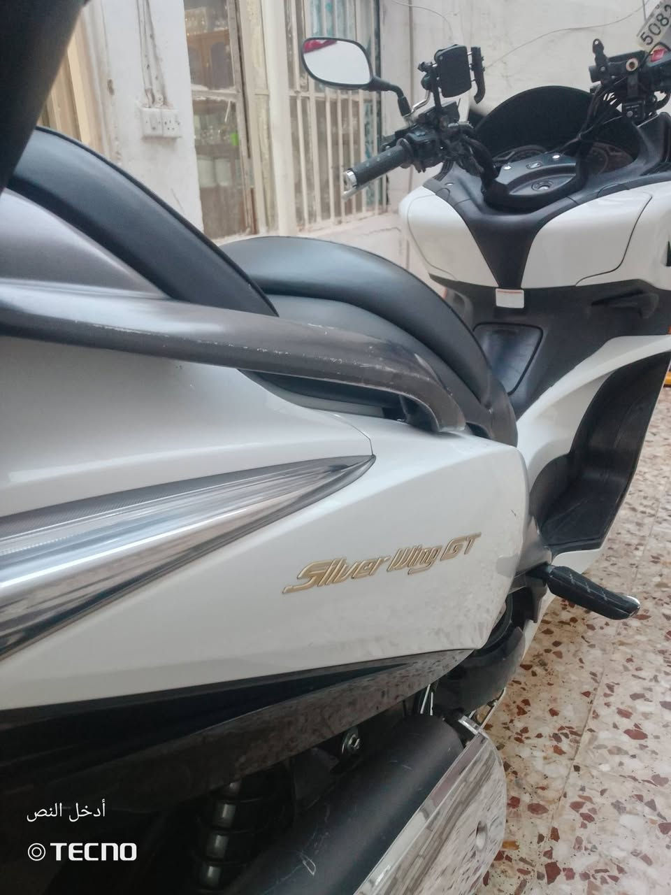 السلام عليكم دراجه سلفر ونج جي تي 600
موديل2016
مواصفات الدراجه
استان كهربائي

كلوب جنطه
دشبول كرستال
شاشه زركه
قاعده جنطه اصليه
تخم تاير جدد
أوفر مود
جوزه سكيورتي
اشاير لد زنون
منظومة زنون  بانزين كله محسن
لايت تراي لأربيل 
للاستفسار 

@إشارة 
***********
