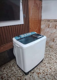 غسالة الحافظ • ١٢ كيلو • غسل وتنشيف