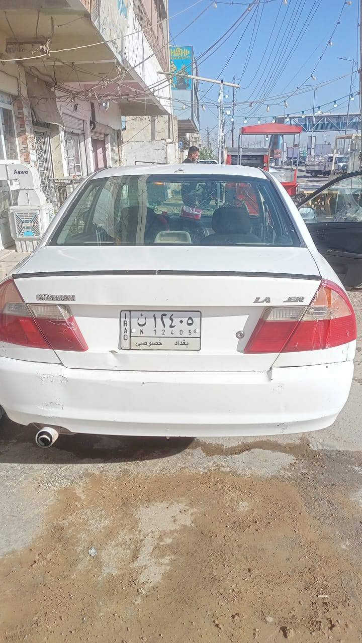 سلام عليكم لانسر موديل 2000 للبيع مابيه لا طخة ولا ضربة رقم بغداد كير اوتوماتيك كير ومكينة جدد شرط تحويل السعر 35 وبيه مجال الرقم *********** المكان ديالى بعقوبة
