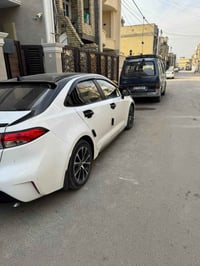 كورلا هايبرد 2024صيني ماشيه 27 مواصفات👇 فتحه بصمه بصمه ابواب +تشغيل را...