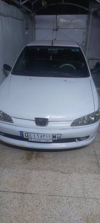 بيجو 2002 للبيع..بأسمي 07728214099