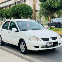 لانسەر مۆدیل 2008  مەکینە گەورە ناوزەرد و فۆڕمیکاو چوار جام کارەبا ئاو...