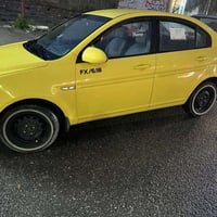 اكسنت • ٢٠١٠ • توماتيك