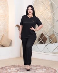 ملابس نسائية • دشاديش • تراكات