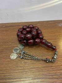 اخوان سبحة كهرمان قديم انتيك33 حبة وزن 80 غرام قطعة حلوة وقديمة وتخط ع...